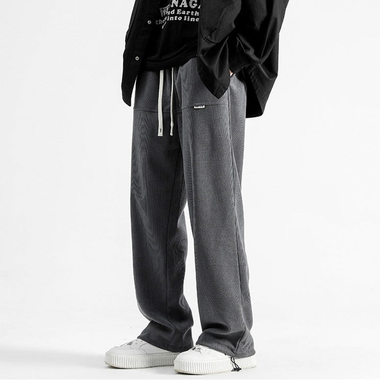Men's casual relaxed corduroy pants, versatile for all-season wardrobe.