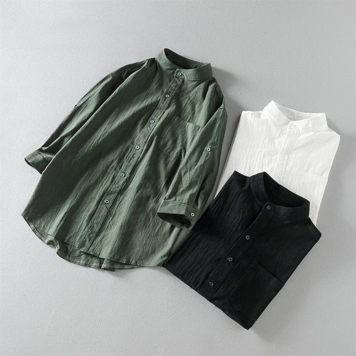 Man wearing a relaxed fit cotton long sleeve button-up shirt, styled casually for everyday wear.