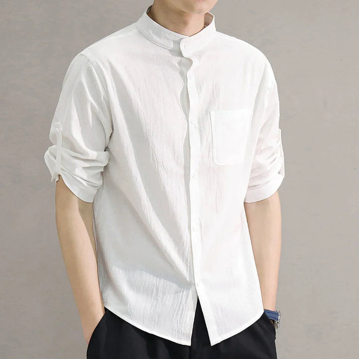 Soft, breathable men's relaxed fit cotton button-up shirt, designed for ultimate casual comfort.