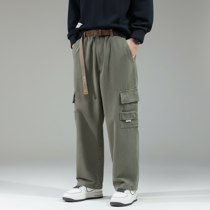 Detailed view of cargo pocket on men's relaxed fit cotton trousers, functional and stylish utility pants.