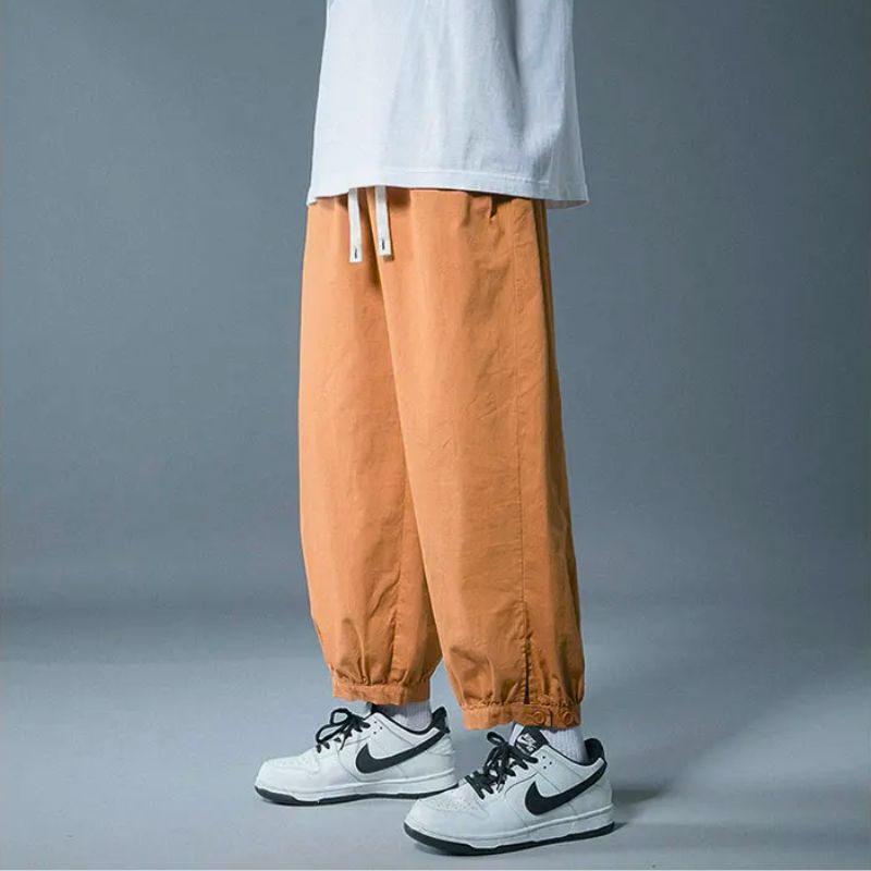 Comfortable men's drawstring pants, relaxed fit, ideal for casual wear, loungewear, or versatile everyday style.