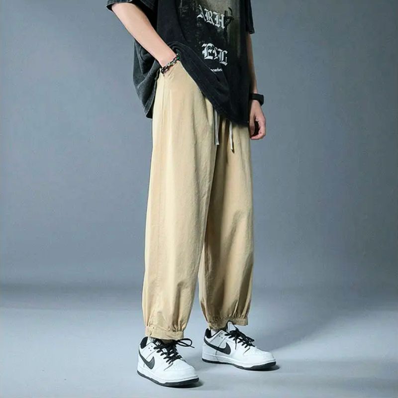 Versatile men's relaxed fit casual pants, perfect as loungewear or for everyday style with a comfy drawstring waist.