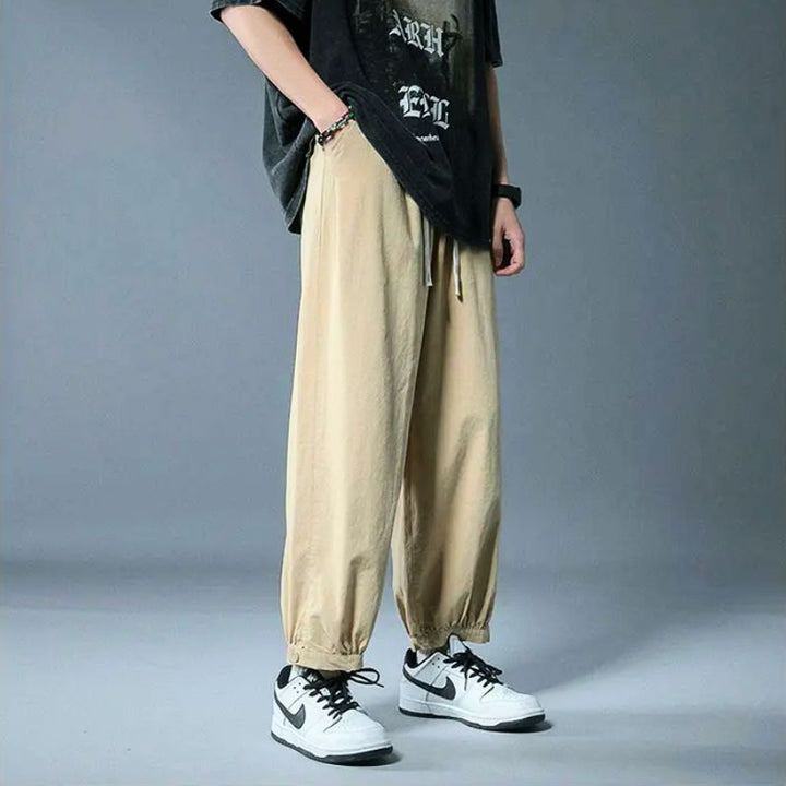 Versatile men's relaxed fit casual pants, perfect as loungewear or for everyday style with a comfy drawstring waist.