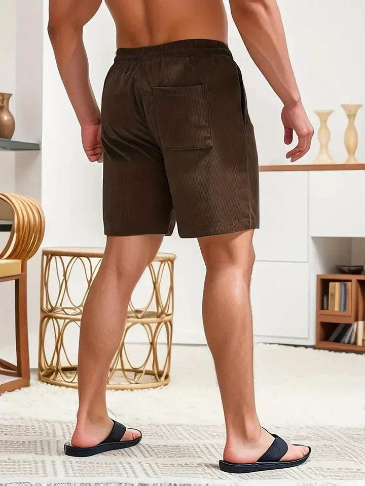 Relaxed fit drawstring shorts for men, offering maximum comfort and style for warm summer days.