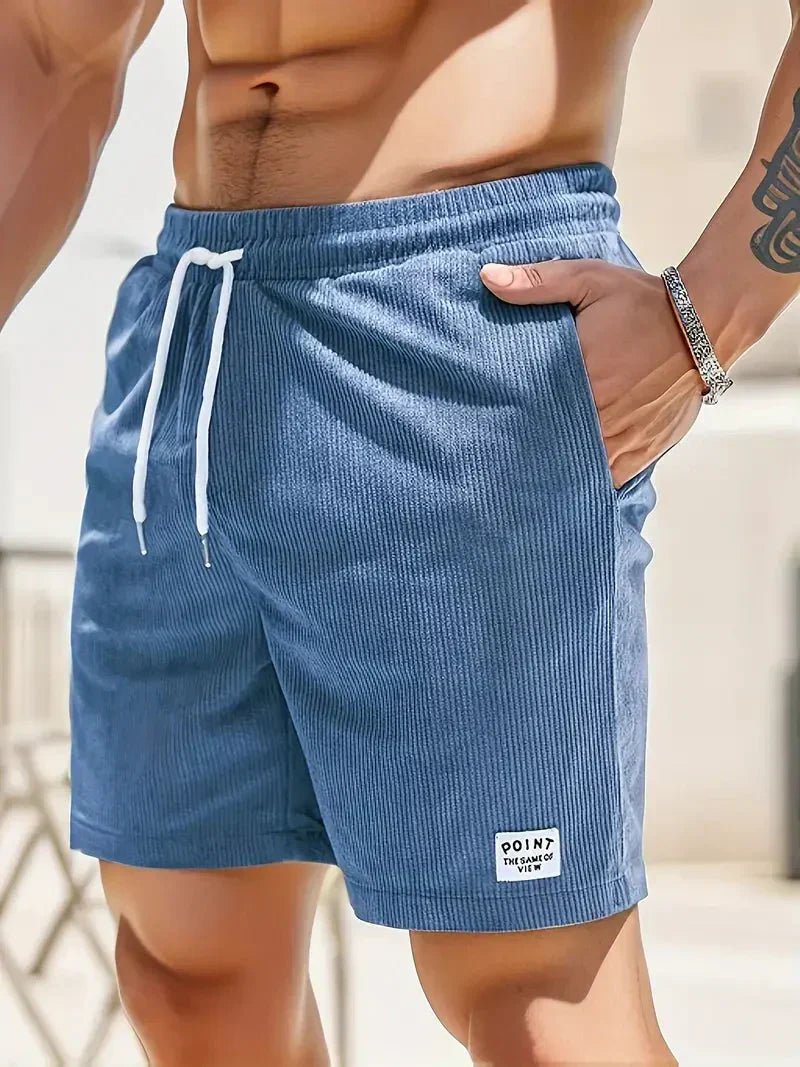 Men's relaxed fit drawstring shorts in a soft fabric, ideal for casual and active summer wear.