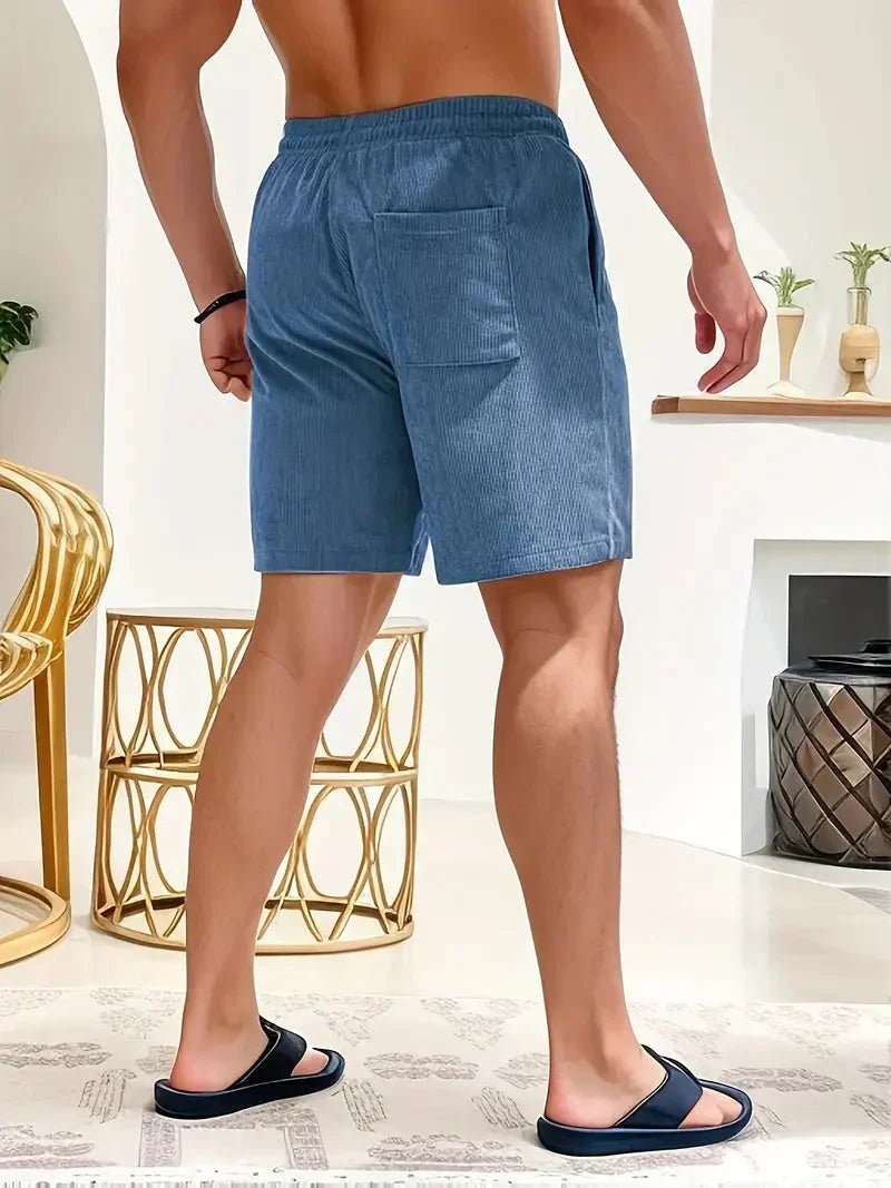 Practical men's drawstring shorts with deep pockets & relaxed fit. Great for casual summer outings.