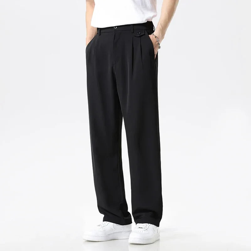 Gray relaxed fit dress pants for men. Comfortable, wrinkle-resistant & ideal for business casual fashion.