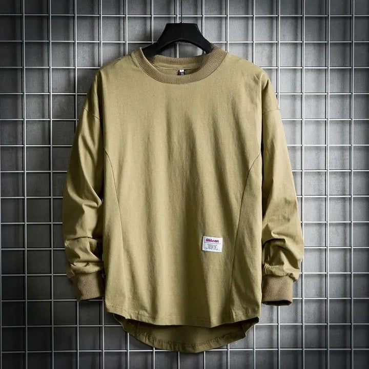 Men's crewneck pullover, relaxed fit with a trendy drop hem, oversized long sleeve for casual style.