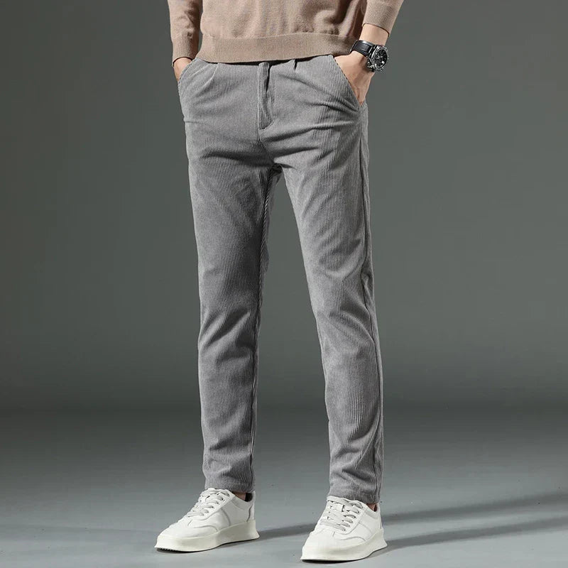 Versatile brown men's relaxed fit corduroy pants, perfect classic casual bottoms.