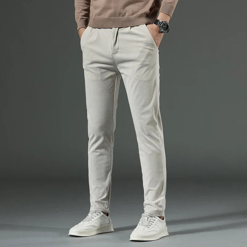 Stylish grey men's relaxed fit cord trousers, ideal for everyday versatile wear.