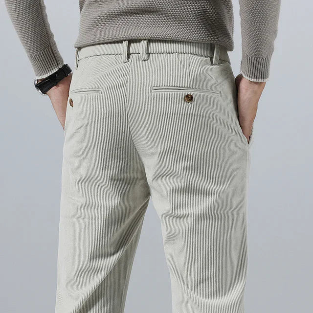 Man wearing comfortable men's relaxed fit Glendale corduroy pants in a casual setting.