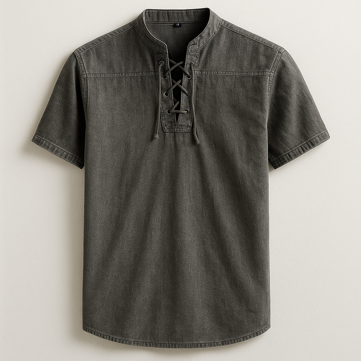 Close-up of a men's casual henley shirt, highlighting the relaxed fit, long sleeves, and detailed lace-up collar.