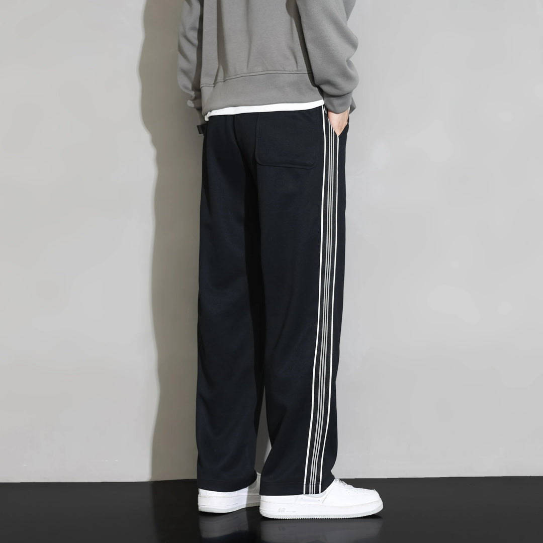 Men's fashion relaxed fit joggers with a sporty side stripe. Straight leg & drawstring, ideal for athletic or lounge pants.