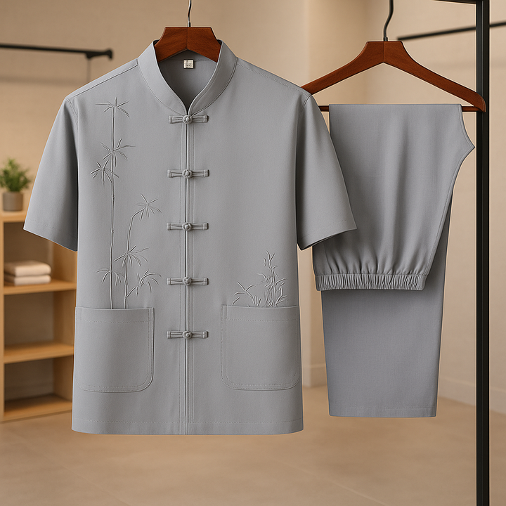 Comfortable men's two-piece leisure set with stylish bamboo embroidery. Relaxed fit casual loungewear for spring/summer.