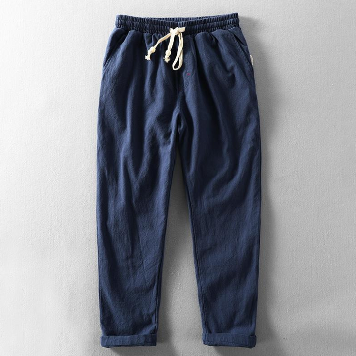 Men's relaxed fit linen trousers for summer. Lightweight, breathable casual pants with a drawstring waist.