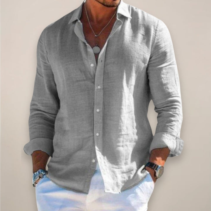 Stylish men's button down shirt. Relaxed fit long sleeve top, perfect for casual or semi-formal menswear.