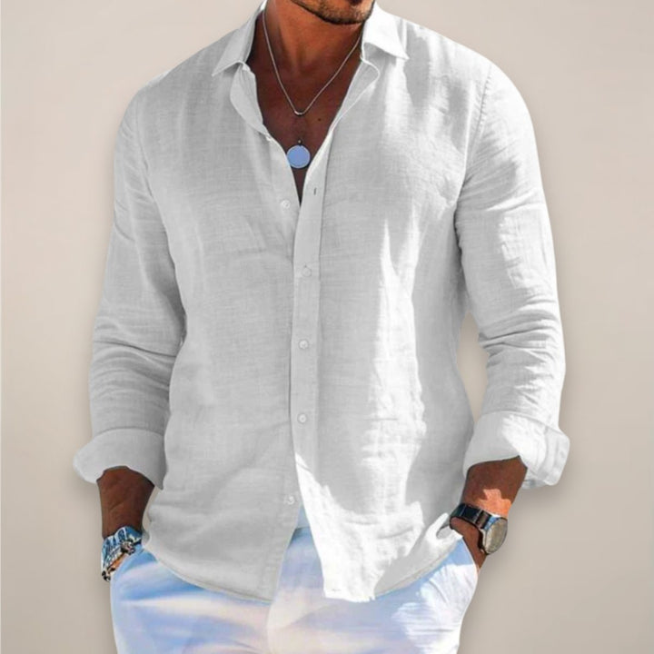 Comfortable men's long sleeve button down shirt. Relaxed fit top, ideal for versatile spring and summer outfits.