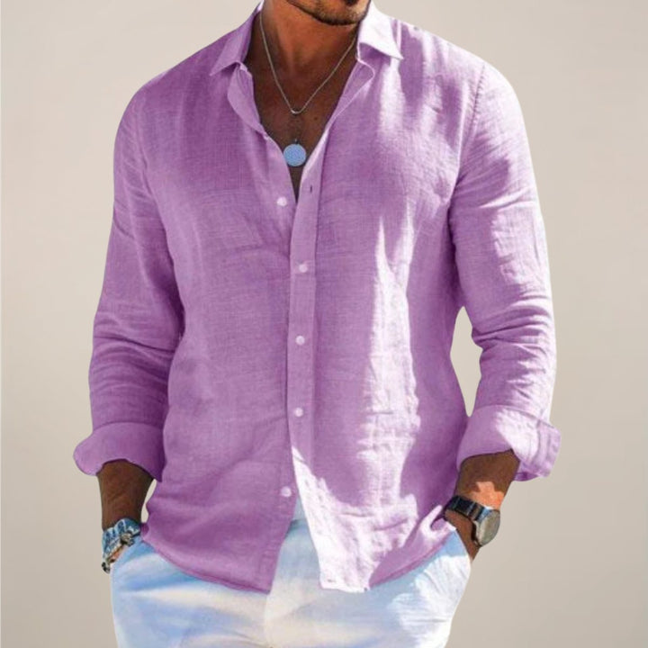 Effortless men's relaxed fit long sleeve button down shirt, a breathable top for warm weather casual menswear.