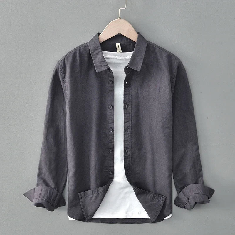 Men's relaxed fit long sleeve button-down shirt in lightweight, breathable fabric for warm weather style.