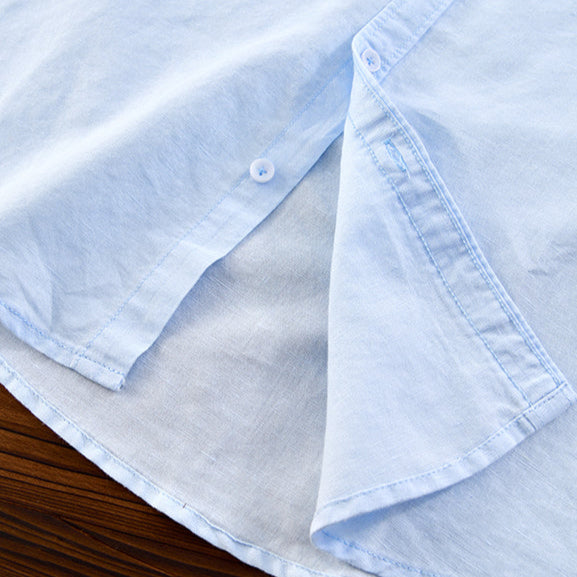 Men's long sleeve button-down shirt, relaxed fit, a classic and breathable choice for summer days.