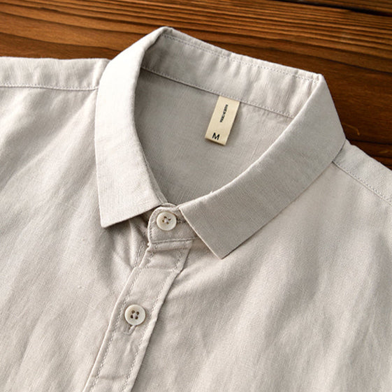 Comfortable men's relaxed fit button-down, long sleeve, lightweight fabric for warm weather apparel.