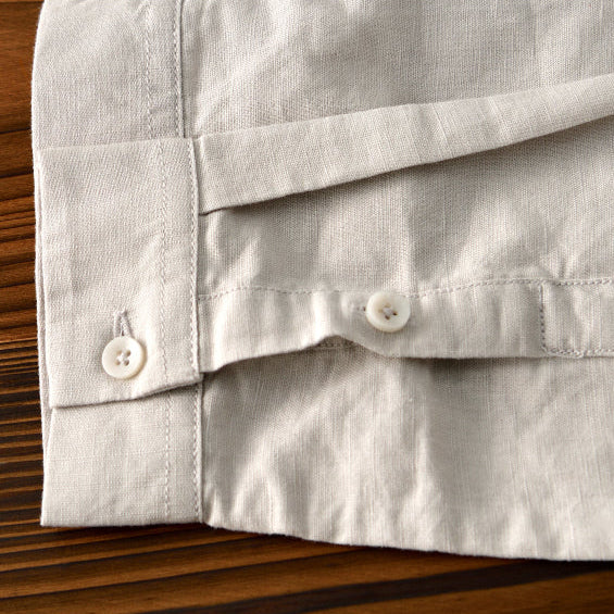 Modern men's relaxed fit long sleeve button-down, a versatile and lightweight choice for warm weather.