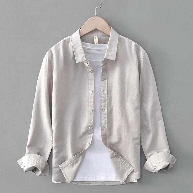Classic men's long sleeve button-down shirt, relaxed fit, a versatile piece for warm weather fashion.