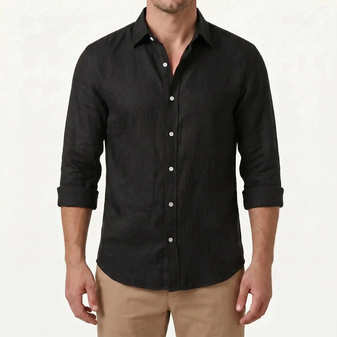 Essential men's long-sleeve casual button-up shirt. Relaxed fit, solid color for versatile smart-casual style.
