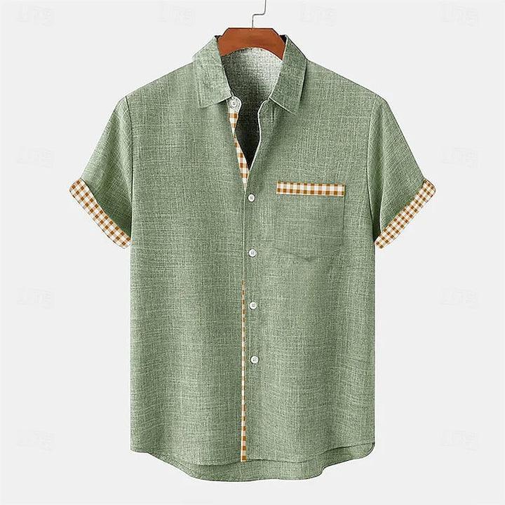 Men's relaxed fit long sleeve button-up shirt for comfortable everyday wear. Ideal for smart casual spring fashion.