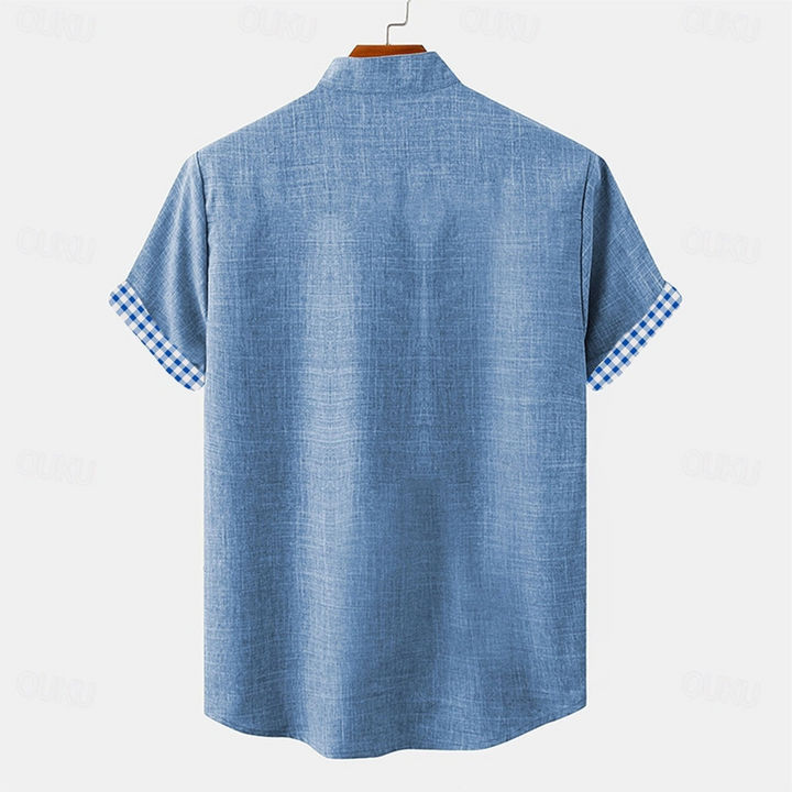 Effortless men's relaxed fit long sleeve button-up shirt with gingham trim. A stylish top for versatile spring fashion.