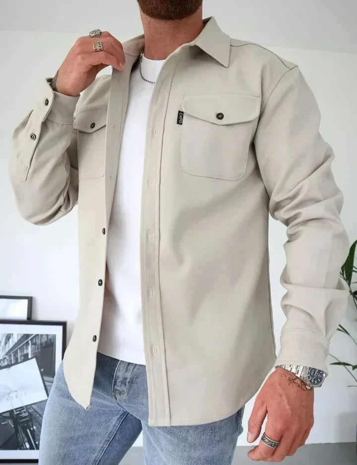 Close-up of soft fabric on a men's relaxed fit autumn casual long sleeve shirt. Comfortable, versatile fall style.