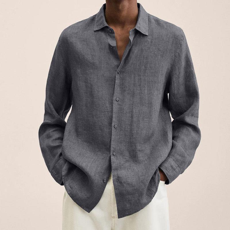 Close-up of the breathable linen cotton fabric on a men's relaxed fit long sleeve shirt, casual style.