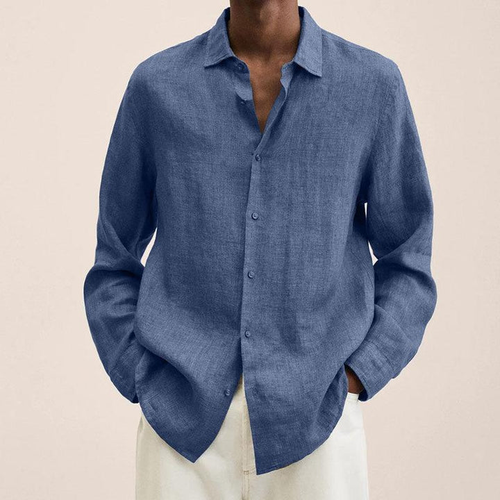 Detail of buttons and collar on a men's relaxed fit long sleeve linen cotton blend shirt, summer fashion.