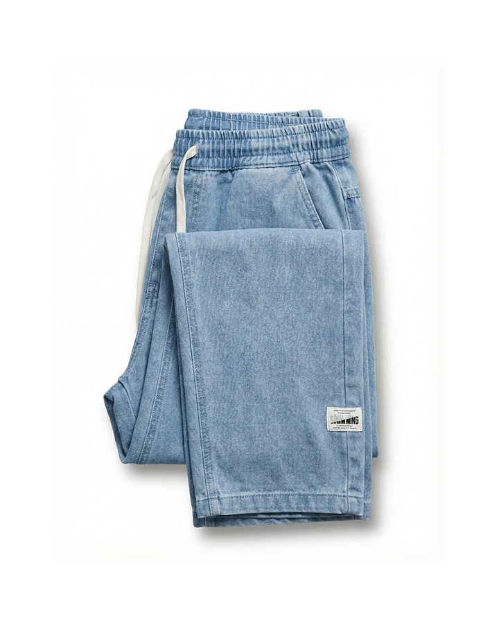 Men's relaxed-fit lounge pants in soft fabric with drawstring, perfect for ultimate comfort & casual home wear.