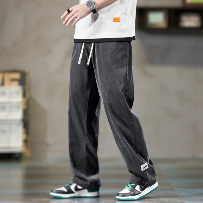 Comfortable men's relaxed-fit lounge pants with drawstring, perfect for travel, home wear, and casual style.