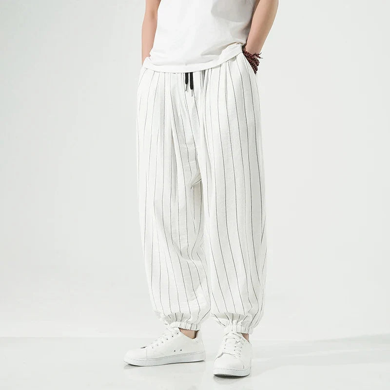 Men's comfortable relaxed fit lounge joggers, versatile for everyday wear with modern elastic cuffs.