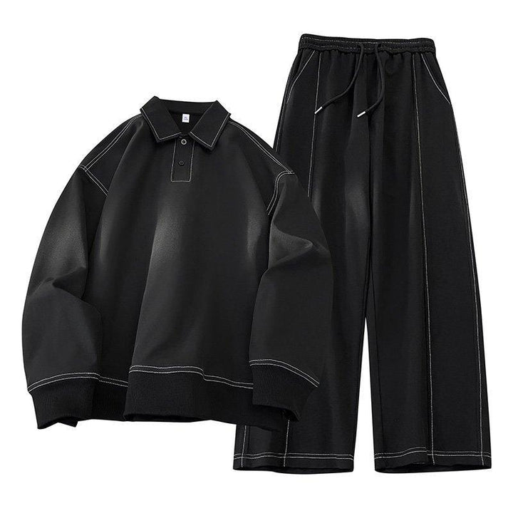 Black men's modern two-piece loungewear set; relaxed fit pullover and drawstring pants for comfort and style.