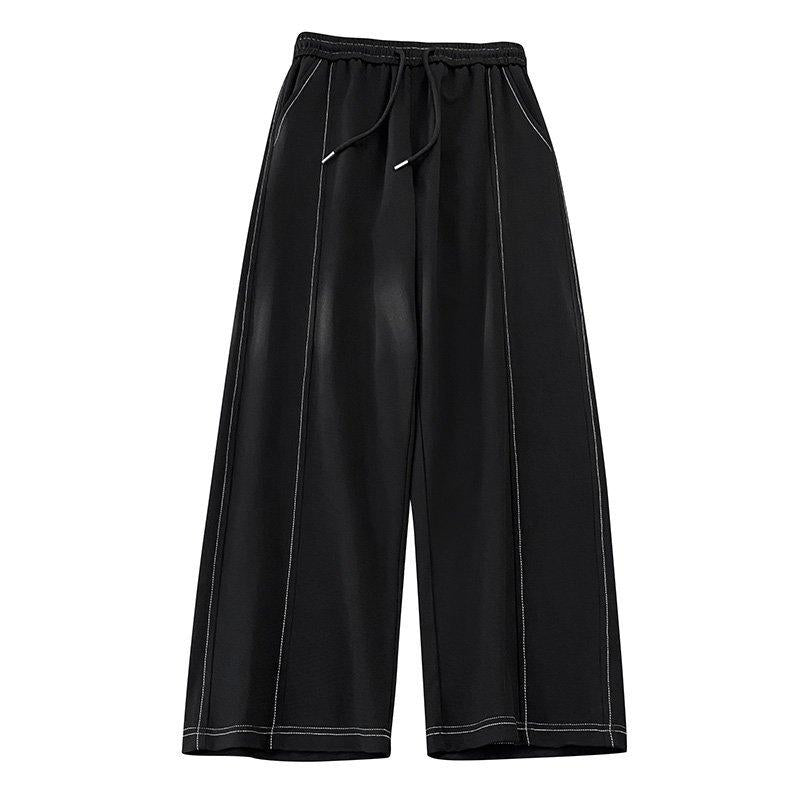 Men's relaxed fit two-piece casual set in black cotton blend. Pullover top & drawstring pants for comfort & style.
