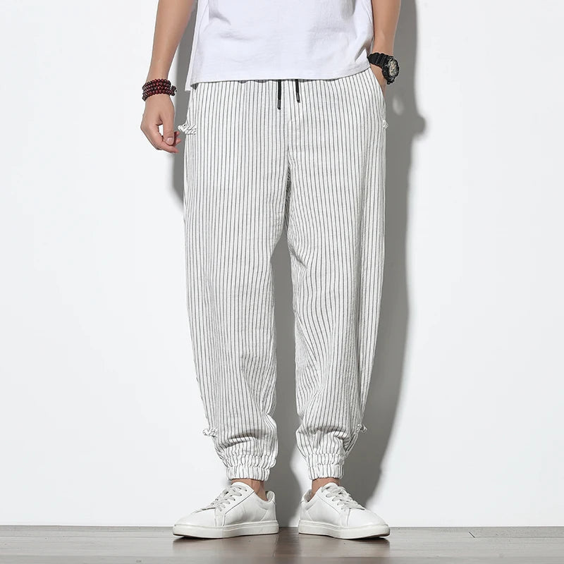 Stylish men's pinstripe joggers, perfect for comfortable casual wear and everyday street style.