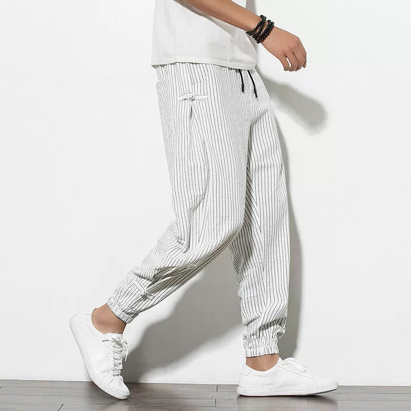 Comfortable men's athletic joggers with subtle pinstripes, ideal for loungewear or casual outings.