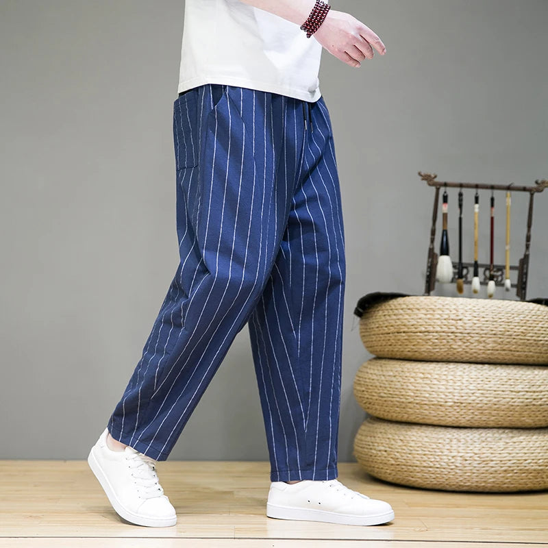Men's relaxed fit pinstripe lounge pants with drawstring, perfect for ultimate comfort and casual weekend wear.