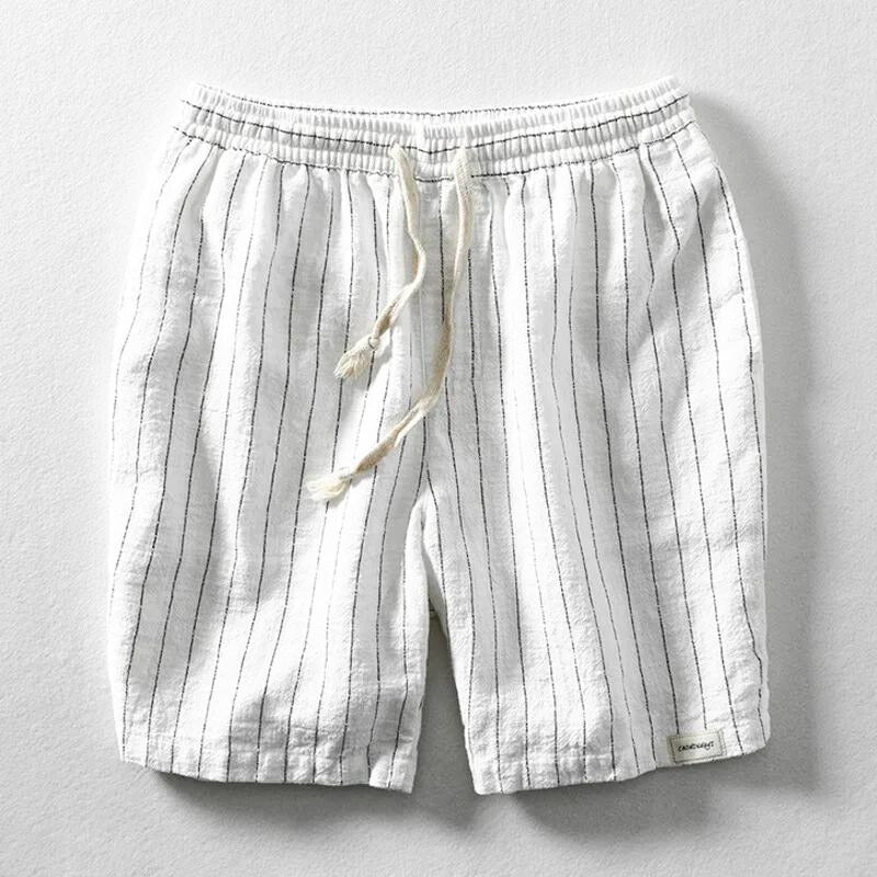 Stylish men's casual pinstripe shorts, relaxed fit & breathable for summer comfort. Features elastic waist.