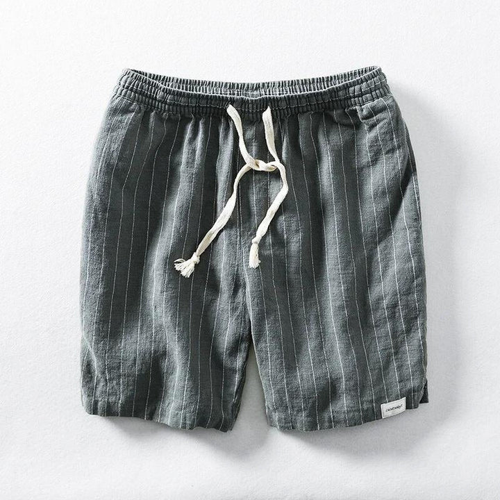 Versatile men's pinstripe summer shorts with a relaxed fit, elastic waist, & drawstring. Perfect for casual wear.