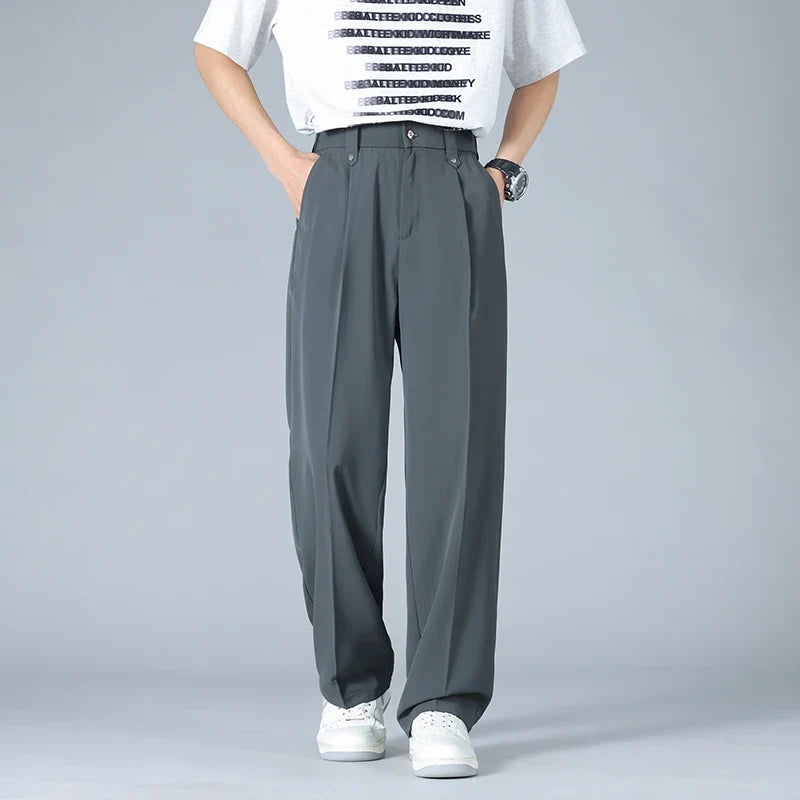 Modern style men's relaxed fit pleated dress trousers, versatile for business casual & smart casual fashion.