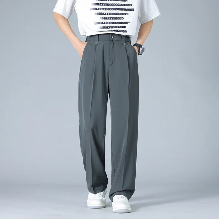 Modern style men's relaxed fit pleated dress trousers, versatile for business casual & smart casual fashion.