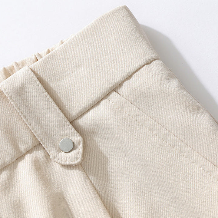 Versatile men's relaxed fit pleated dress trousers, great for business casual to formal wear. Modern comfort.