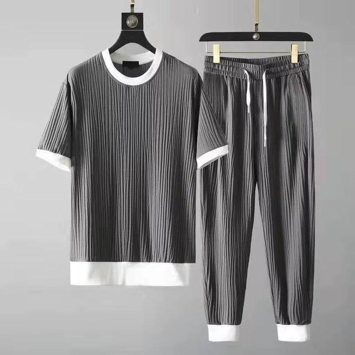 Men's relaxed fit pleated loungewear set in grey, perfect for off-duty style & all-day comfort. Matching casual outfit.