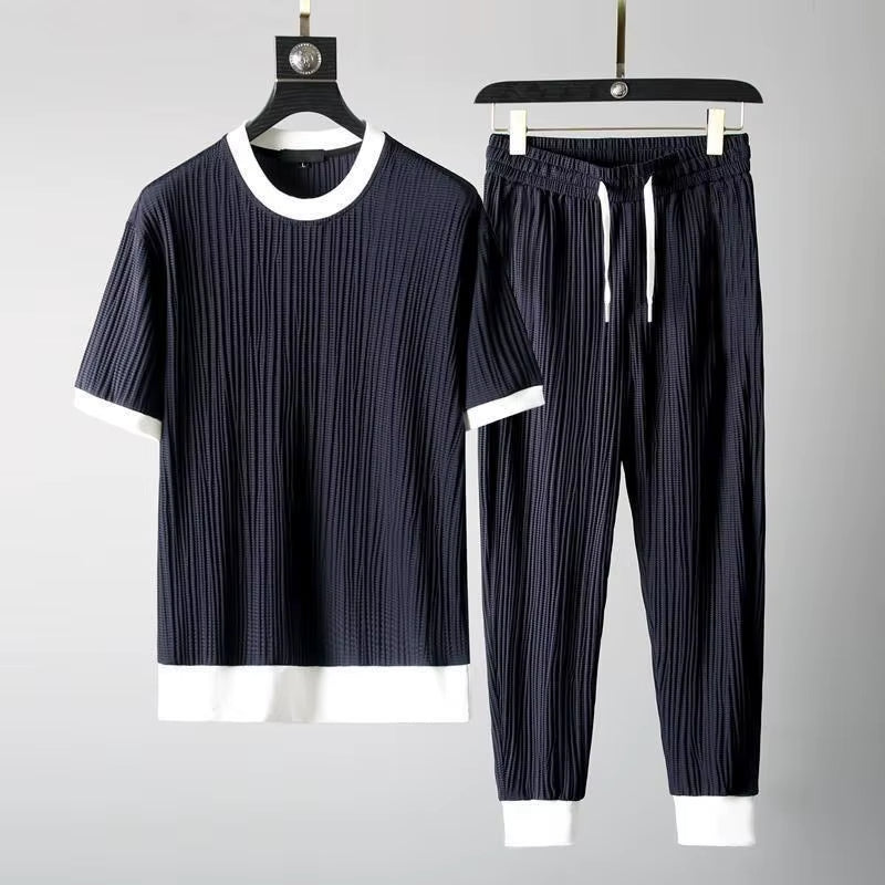 Comfortable men's pleated lounge set in a versatile blue, offering relaxed fit and stylish off-duty wear.