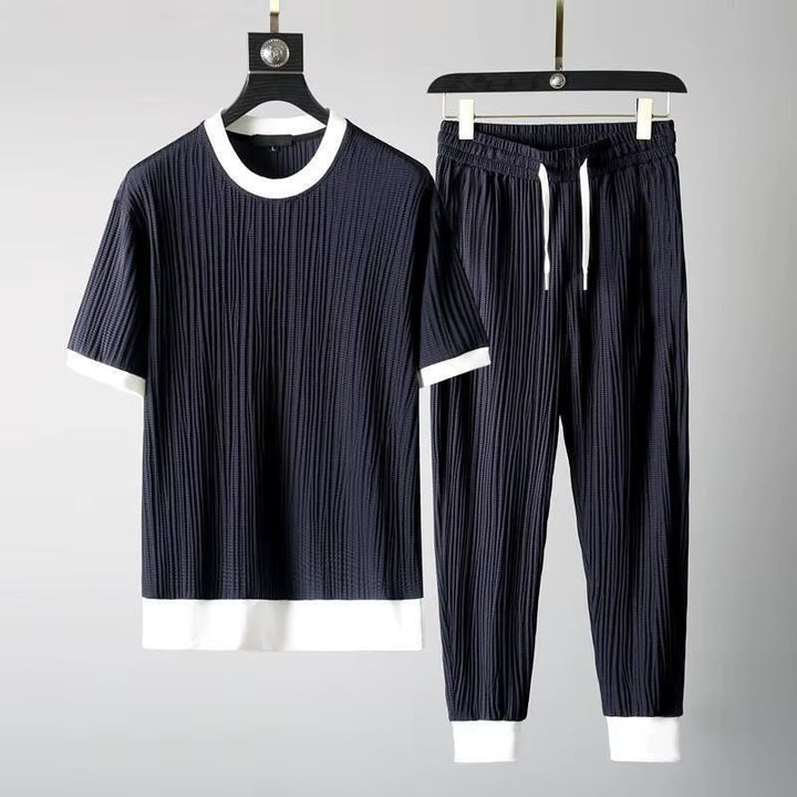 Comfortable men's pleated lounge set in a versatile blue, offering relaxed fit and stylish off-duty wear.
