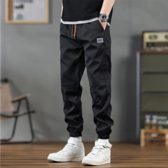 Men's casual joggers with a comfortable drawstring waist, relaxed fit, and modern tapered leg, great for active comfort.